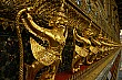 The golden statues that adorn the Grand Palace; Bangkok, Thailand