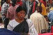 Embroidered white blouses and gold necklaces are indicative of the women from the Otavalo region.