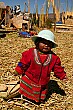 This precocious girl happily posed for pictures on one of the reed islands constructed by the Uros people.