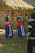 Young boys and girls toss balls to each other in a kind of courtship practice.