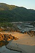 Sun sets on the river beach along the Mekong.