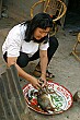 This lady was cleaning some kind of small deer (NO, it wasn't a cat...)