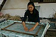 This lady shows us how she produces hand-made paper.