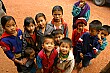 All the kids peer up at the camera, hoping to get a glimpse of themselves in the digital playback.