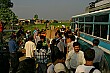Hotel touts swarm the bus as it arrives at Royal Chitwan National Park.
