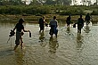 Our jungle walk through Chitwan took us through all kinds of terrain, including mud, tall grass, and yes, even rivers.