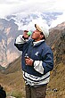 Our guide Freddy rewards himself with a swig of rum.